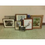 A selection of framed and glazed prints, photographic prints, and key display