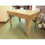 A modern oak occasional table made from reclaimed floorboards