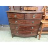 A 19th century mahogany bow front chest of two short over three long drawers