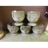 A set of five garden pots with Greek key rim over grape design