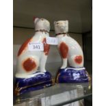 A pair of crackle effect Staffordshire cats