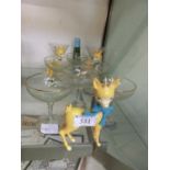 Six Babycham glasses together with three Bambis and two other Babycham glasses and a candle