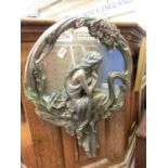 A reproduction Art Nuveau style mirrorHeight: 69cm  Mirror diameter: approx 40cm