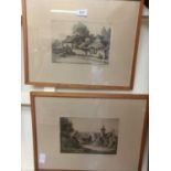 Two framed and glazed etchings of period buildings signed in pencil
