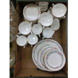 A tray containing a part Paragon floral decorated tea/dinner set to include plates, cups, saucers,