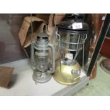 Two early 20th century hurricane lamps