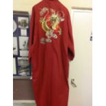 A red Japanese dragon design kimono