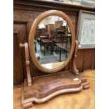 A Victorian mahogany swing toilet mirror