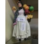 A Royal Doulton figurine 'Biddy Penny Farthing' HN1843