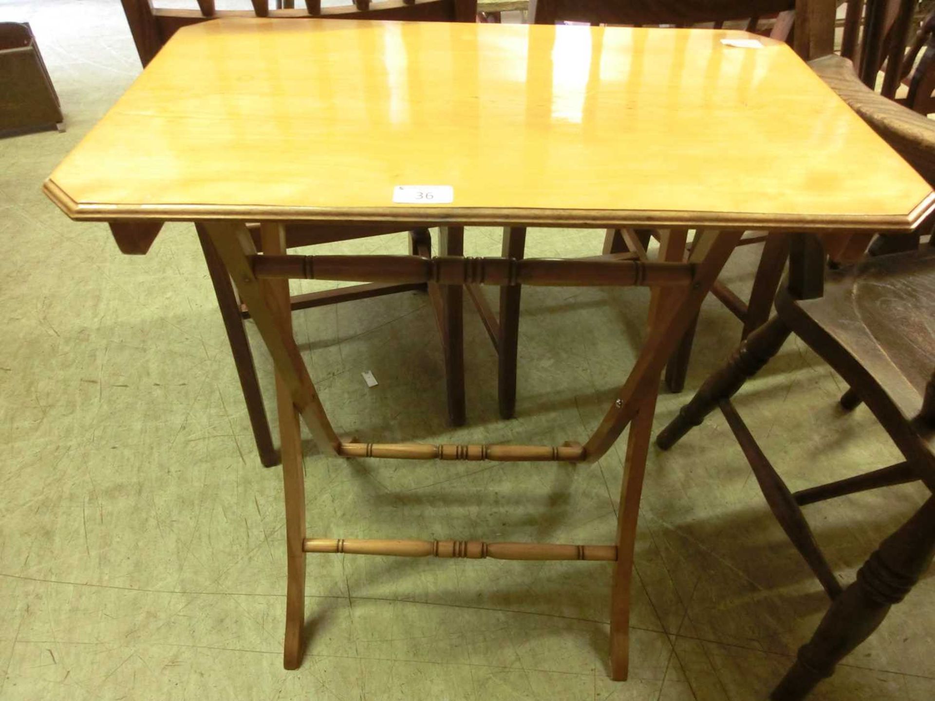 A modern beech effect folding table