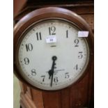 A circular mahogany framed clock by Smith's