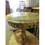 A small gilt metal and onyx circular occasional table