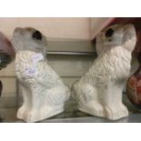 A pair of Staffordshire hearth dogs