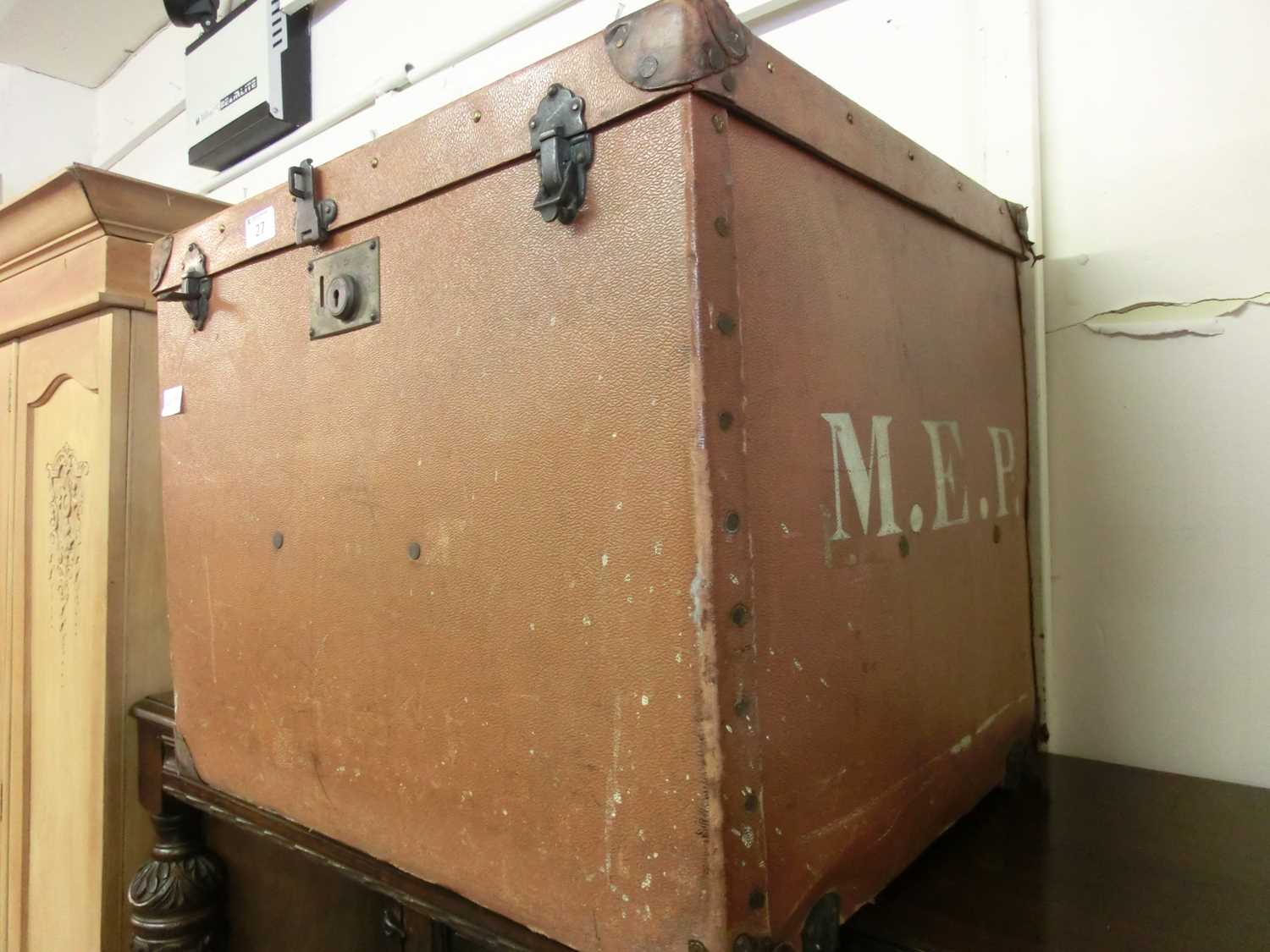 An early 20th century canvas travelling trunk