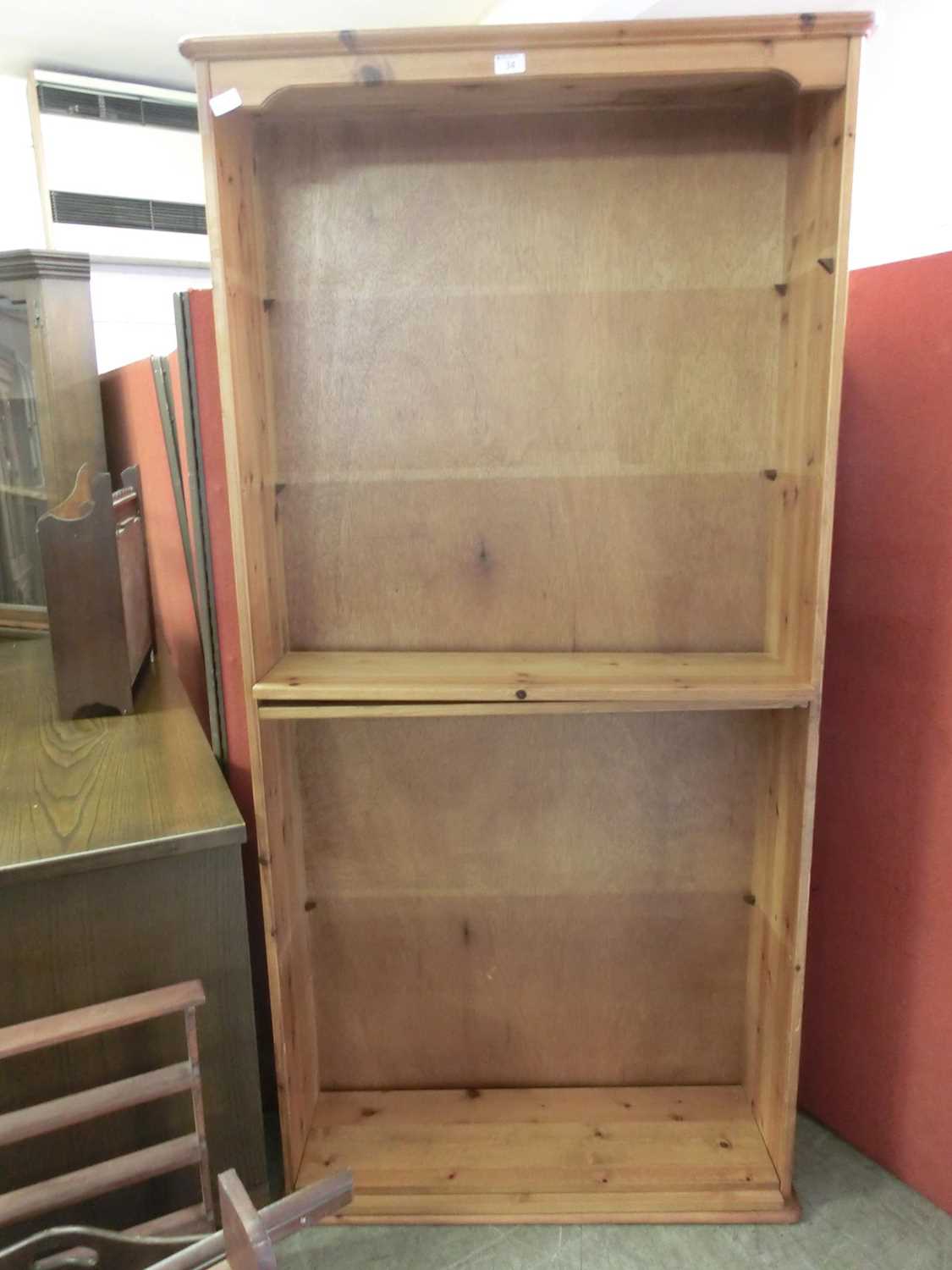 A modern full height pine bookcase