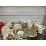 A selection of Coronation mugs and glasses celebrating Queen Elizabeth II, George VI etc