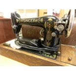 A cased Singer sewing machine