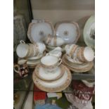 A part Old English tea set comprising of cake plates, side plates, cups, saucers, together with a