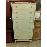 A grey/green G-Plan chest of seven drawers