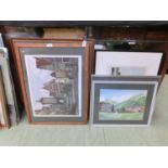 Two framed and glazed prints of continental street scenes, along with two watercolours and a print