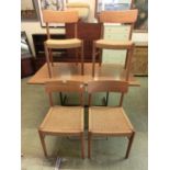 A set of four mid-20th century design teak and woven seated chairs possibly by Arne Hovmand Olsen