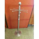 A short metal revolving coat rack