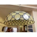A leaded glass ceiling hanging light shade