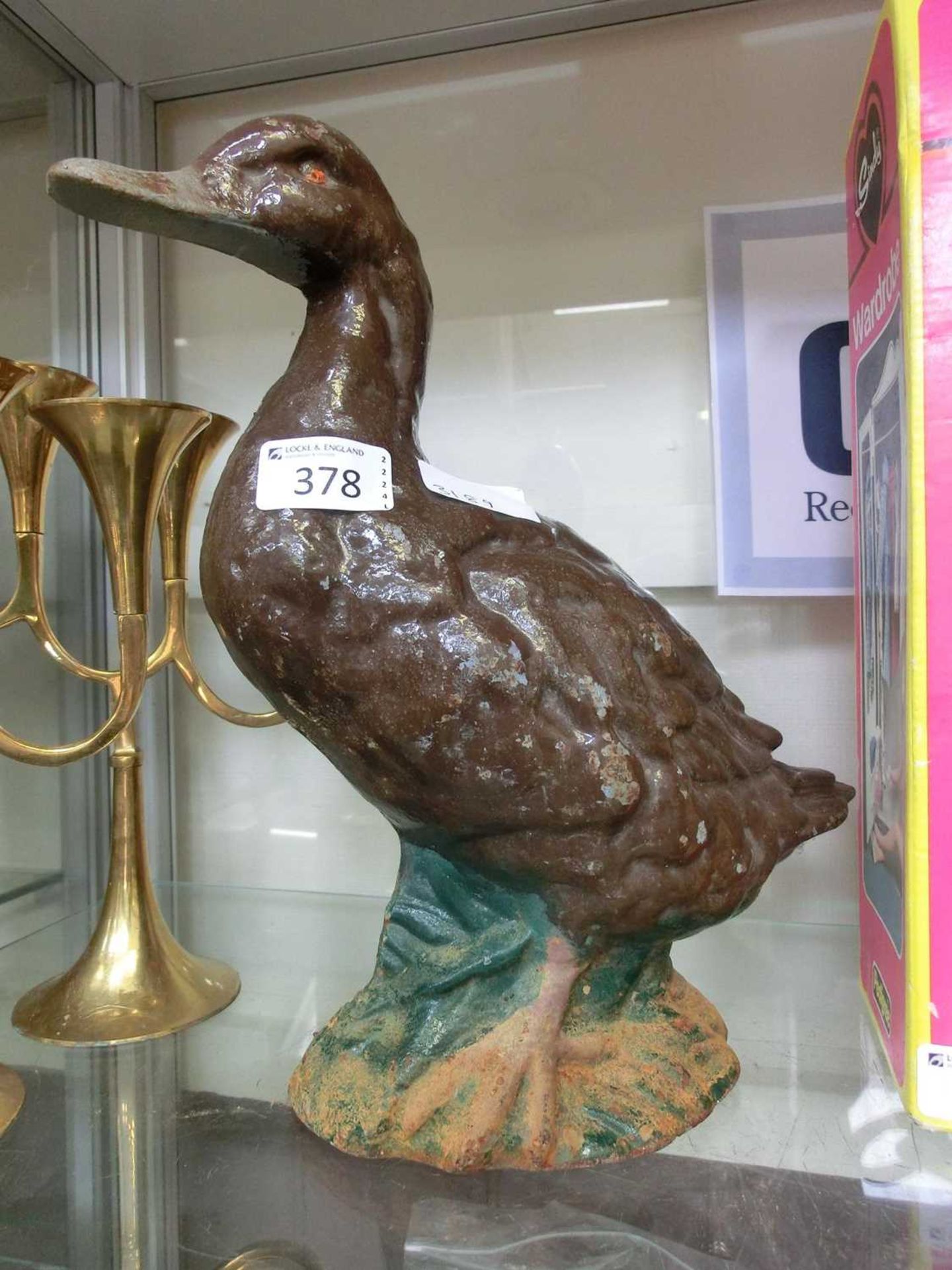 A cast iron doorstop in the form of a duck