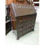 An early 20th century oak bureau