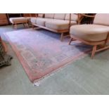 A pink ground Chinese style rug