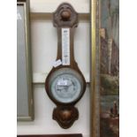 An early 20th century banjo barometer by John Elkman Ltd of London