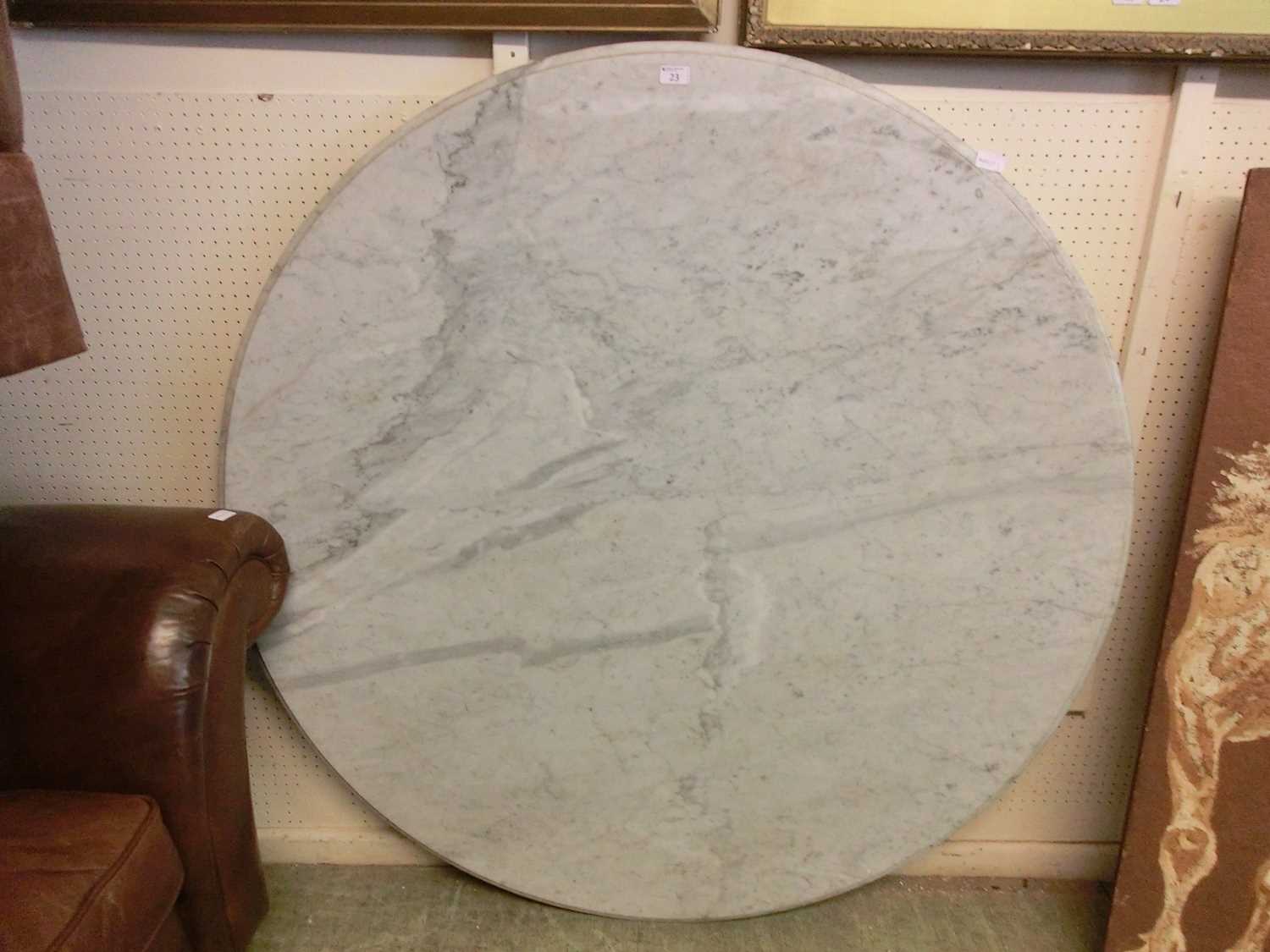 A grey veined white marble circular table top with moulded edge, diameter approximately 135cm