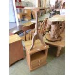 A modern pine bedside cabinet along with a pine occasional table