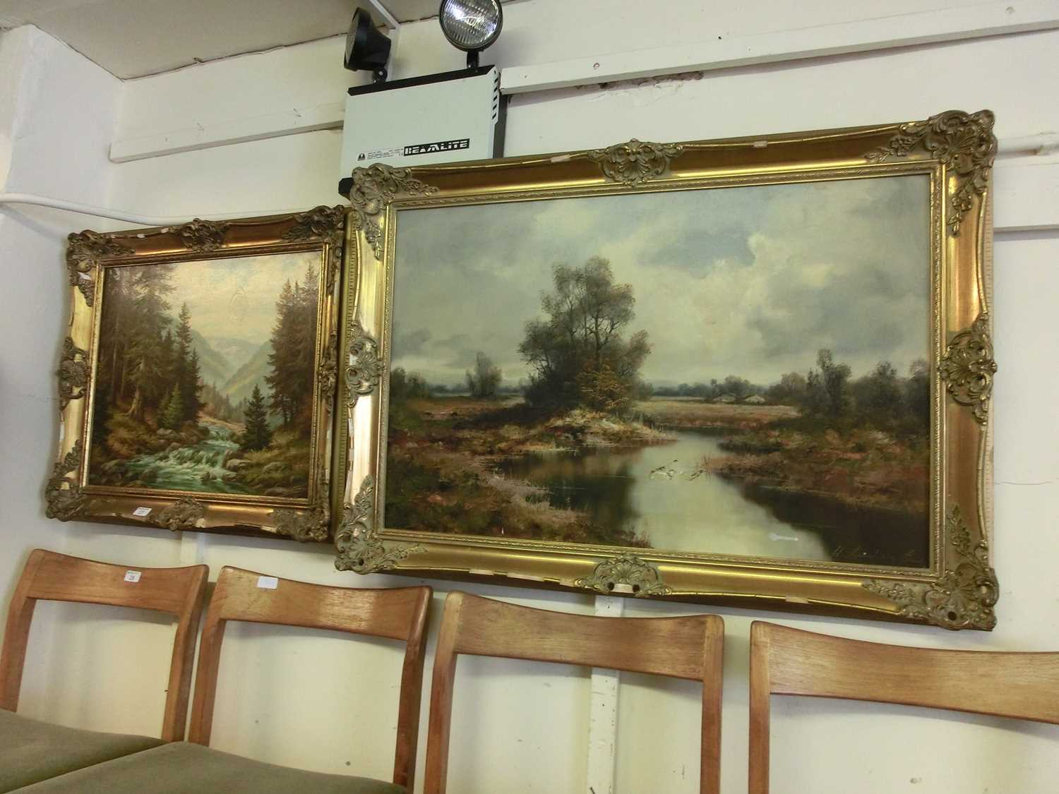 Two ornate gilt framed oil on canvases of river scenes