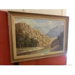 A gilt framed oil on board of river through mountain scene signed R.C.Roelofsz