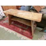 A hand crafted elm low level table