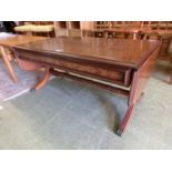 A modern mahogany and ash banded coffee table