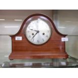 A mahogany inlaid mantle clock