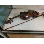 A violin with bow (A/F)