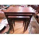 A nest of three reproduction occasional tables