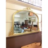 A reproduction gilt painted over mantle mirror