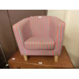 A child's red striped chair