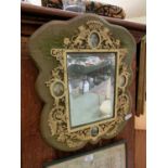 An early 20th century mirror having a pierced carved plaque