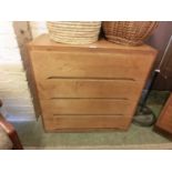 A mid-20th century ply four drawer chest