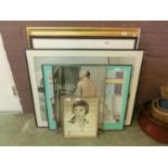 A selection of framed and glazed prints, advertising posters etc.