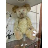 An early 20th century teddy bearBear is approximately 26 inches (66cm) tall and condition