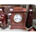 An early 20th century oak cased mantle clock