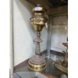 A 19th century brass oil lamp stand converted to electricity