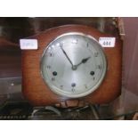 A mid-20th century Enfield oak cased Westminster chime mantle clock