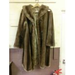 A ladies faux fur coat